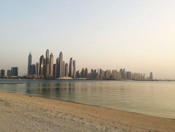 View of city skyline against clear sky