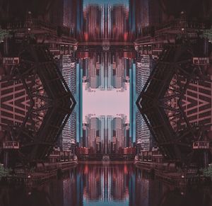 Digital composite image of illuminated buildings in city