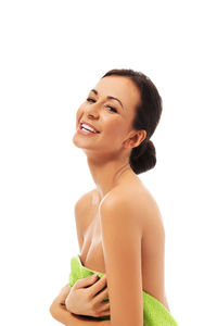 Portrait of a smiling young woman over white background