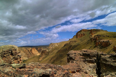 Scenic view of rocky mountains against sky