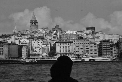 Buildings in city against sky