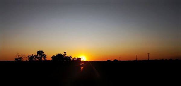 Scenic view of silhouette landscape against sky during sunset