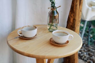 Close-up of coffee cup on table