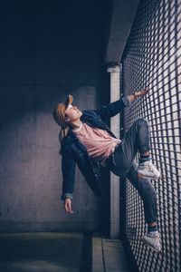 Young woman on grid