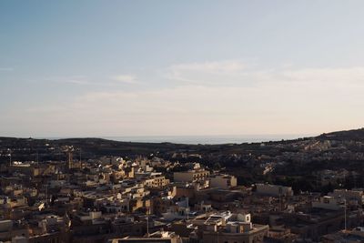 High angle shot of townscape against sky