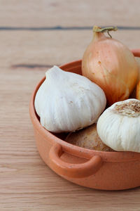 Close-up of garlic on cutting board