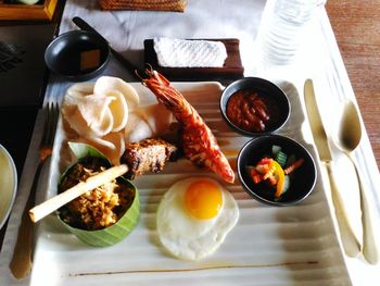 High angle view of breakfast served on table