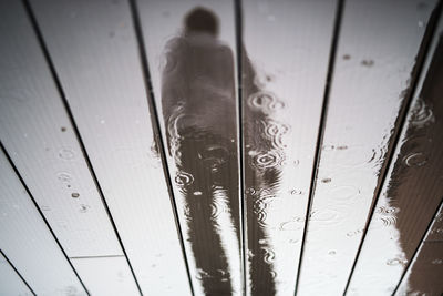 High angle view of water drops on floor