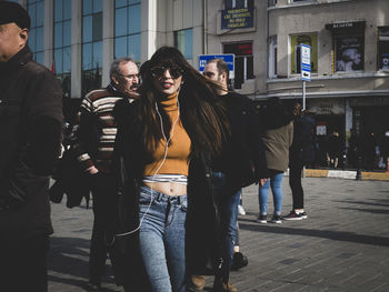 People standing on street in city