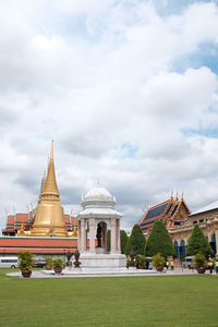 Temple against cloudy sky