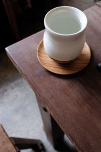 High angle view of coffee cup on table