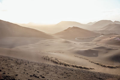 Scenic view of desert against sky