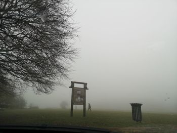 Built structure on field against sky