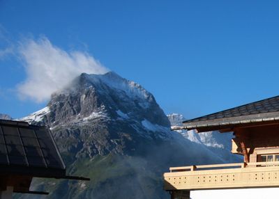 Snow covered mountain against clear sky