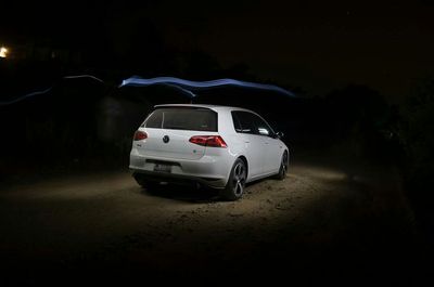 Cars on road at night