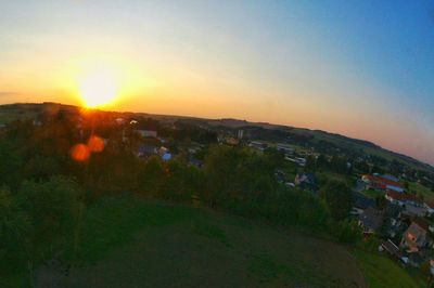 Scenic view of city during sunset