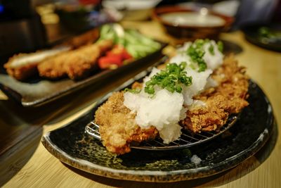 High angle view of meat in plate on table