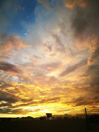 Scenic view of dramatic sky during sunset