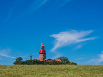 Traditional windmill against blue sky