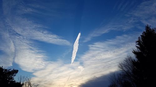 Low angle view of vapor trail in sky