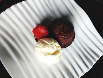 High angle view of strawberries in plate