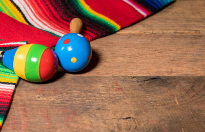 High angle view of multi colored balls on table