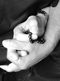 Close-up of hands holding baby hand