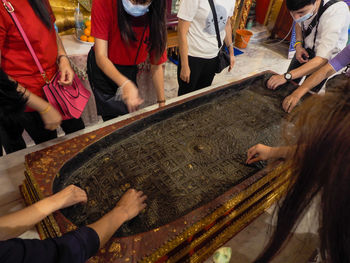 High angle view of people at temple