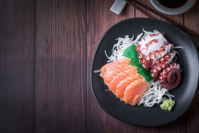 Directly above shot of sushi served on table