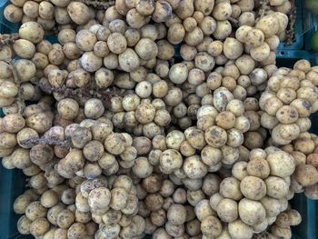 Full frame shot of onions for sale at market stall