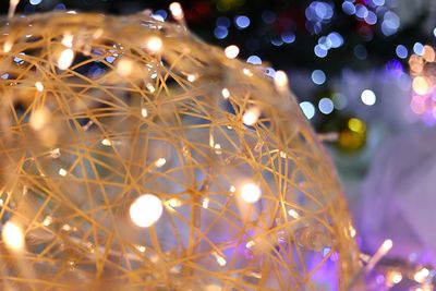 Close-up of illuminated christmas tree at night