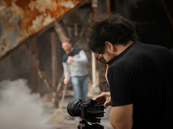 Woman photographing through smart phone