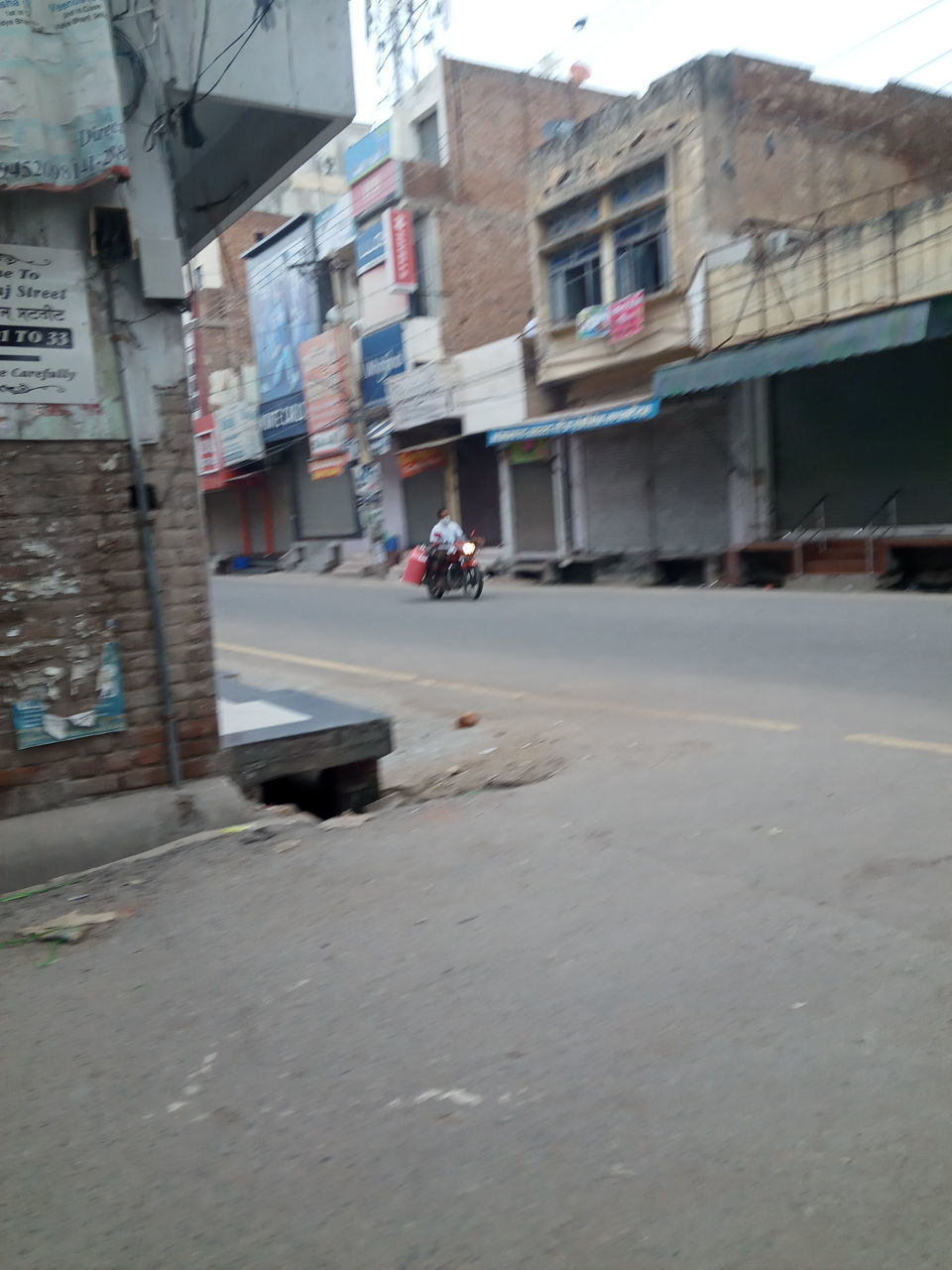 STREET AMIDST BUILDINGS