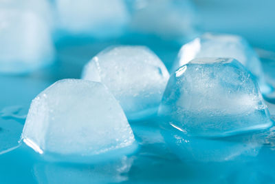 Close-up of ice crystals against blue background
