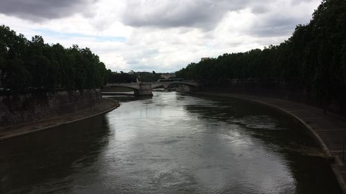 View of river against cloudy sky