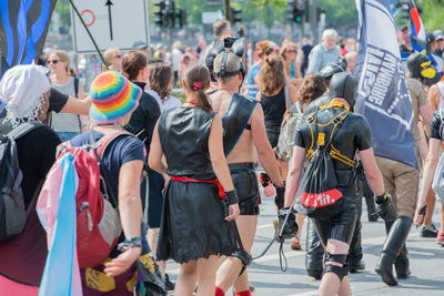 People walking on street in city