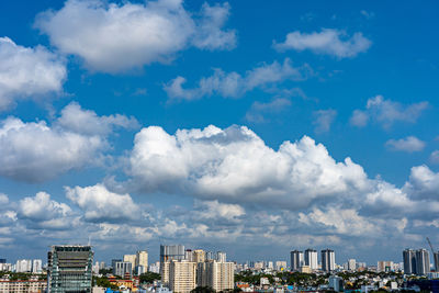 Modern buildings in city against sky