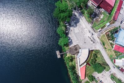 High angle view of road by river in city