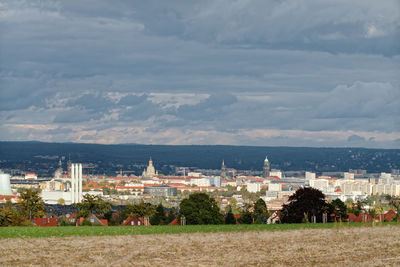 Scenic view of sea and buildings against sky