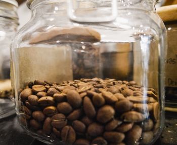 Close-up of coffee beans in glass jar