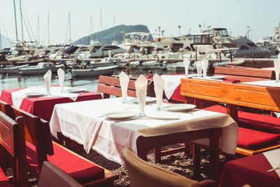 Empty chairs and tables at restaurant