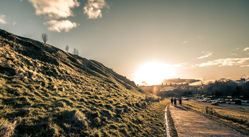 Panoramic view of road against sky during sunset