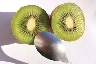 Close-up of fruits against white background