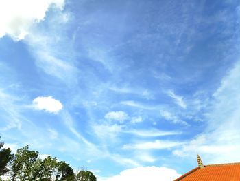 Low angle view of building against blue sky