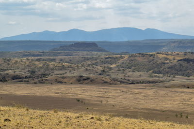 Arid landscape against a mountain background, lake magadi, rift valley, kenya