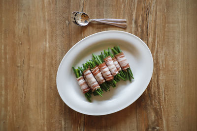 High angle view of fish in plate on table