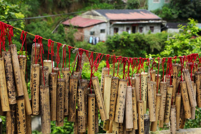 Close-up of padlocks hanging on railing