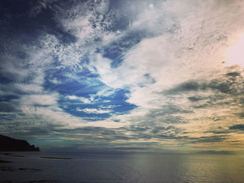 Scenic view of dramatic sky over sea