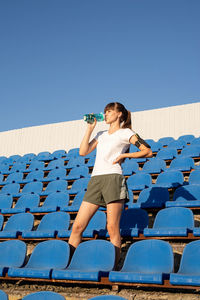 Healthy lifestyle concept. teenage doing sports alone at the empty stadium