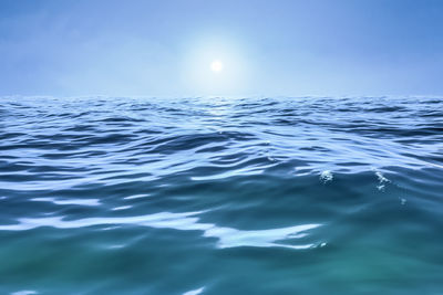 Scenic view of sea against blue sky